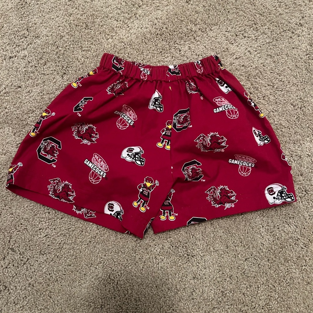 Carolina Gamecock shorts perfect for games! No size but fits like a 2T.